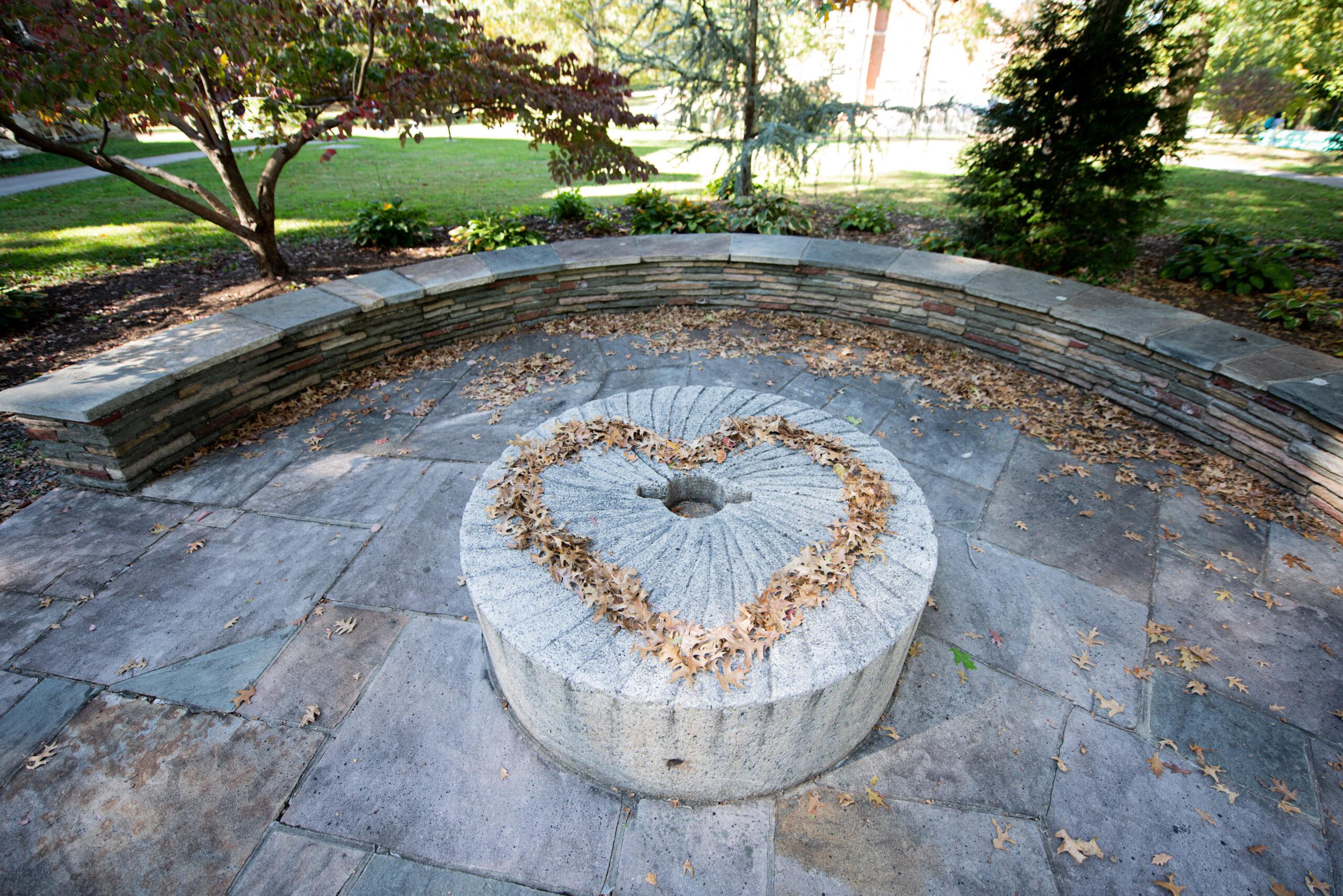 Leaves arranged into a heart on Berea College's campus